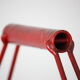 Red metal bottle holder
