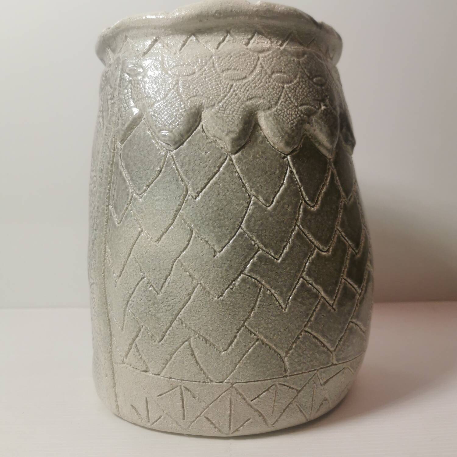 Ceramic vase or pot in gray beige color