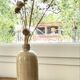 Beige stoneware bottle vase