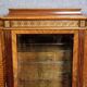 Important showcase library in fine wood and marquetry, stamped.