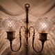 Two-light wall light gold with antique crystal globes