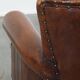 Sheepskin armchair/lounge chair finished with decorative nailheads