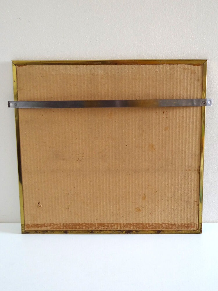 Miroir en métal doré 36 x 34 cm