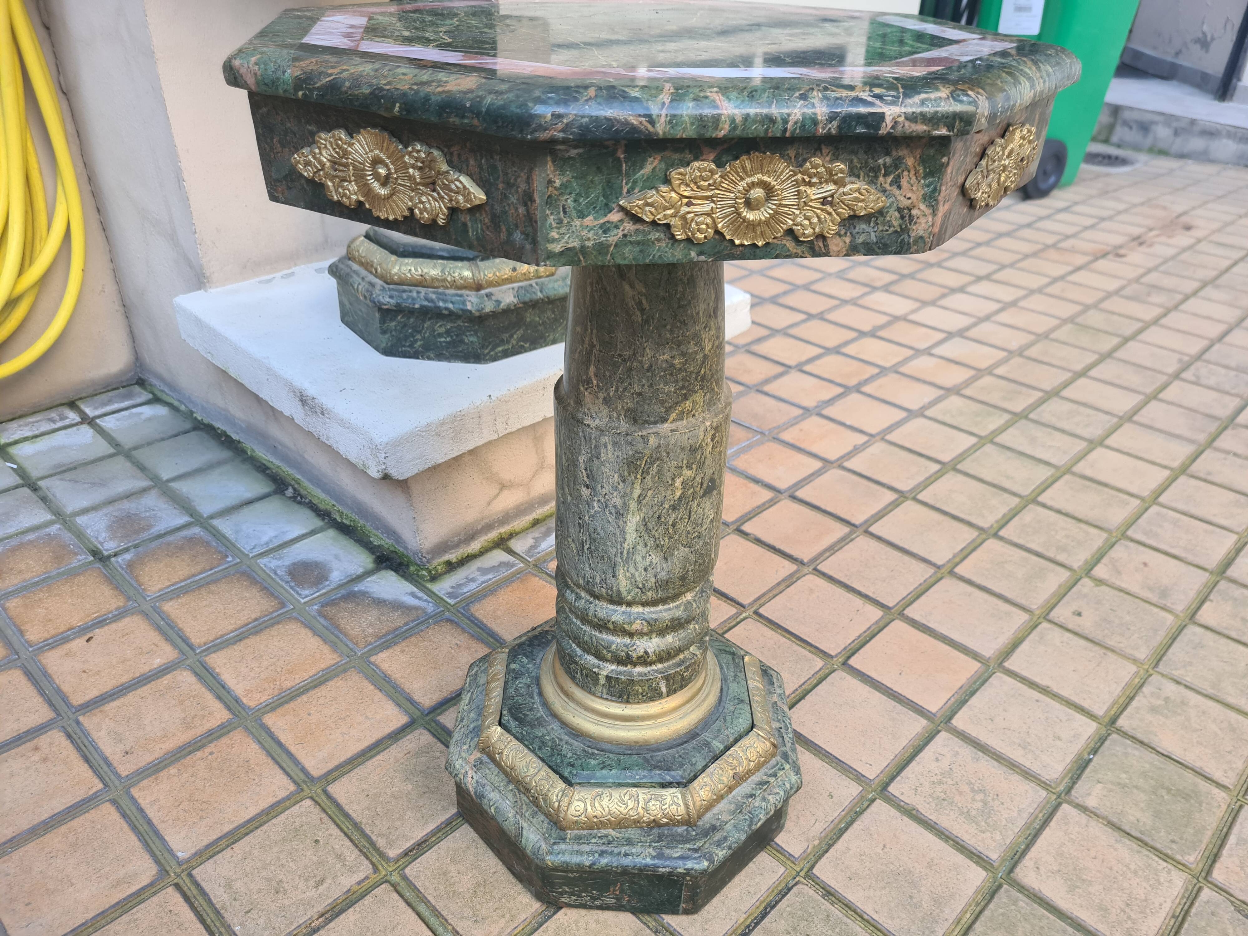 Pair of green marble pedestal tables, 19th century