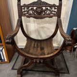 Curule Dagobert armchair in walnut