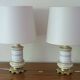 Lot including 2 oil lamps from the 19th century, equipped with their electric wire.