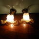 Wall lamps, opaque corolla and iridescent ochre lampshade, brass and wood support