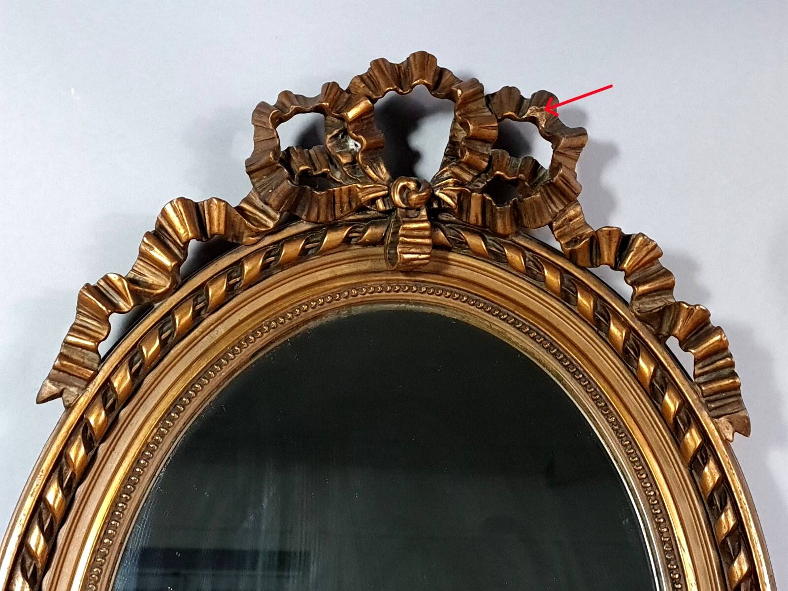 Oval mirror with antique Louis XVI style frame, original gilded stucco wood, 58x40 cm