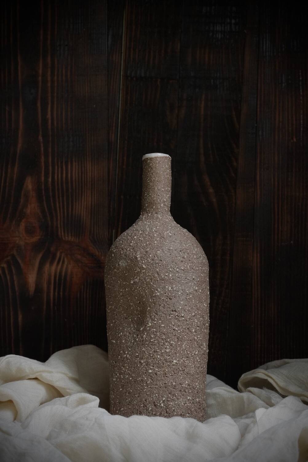 Ergonomic stoneware oil bottle