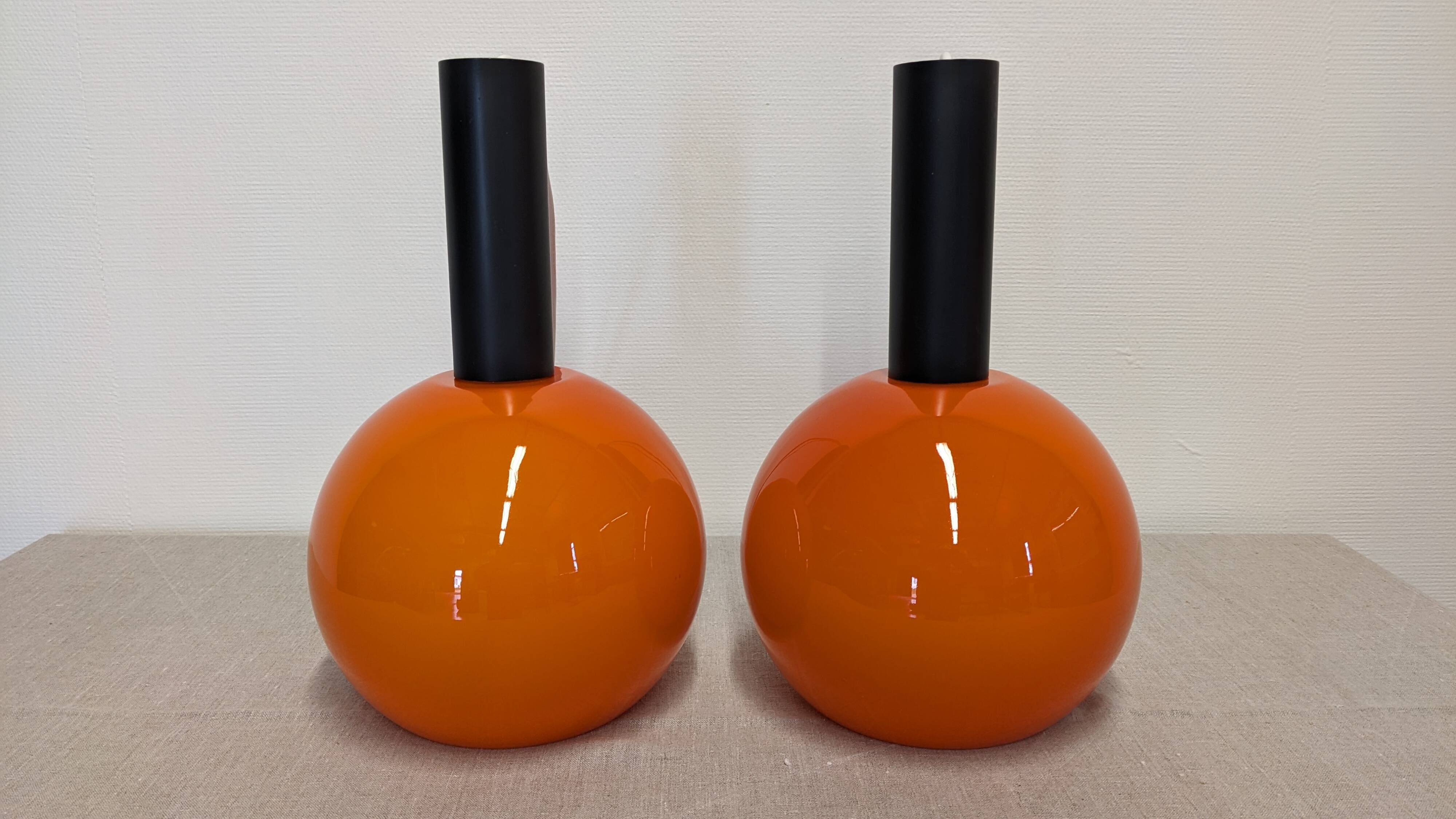 Pair of orange opaline ball pendants by Parscot, France circa 1970