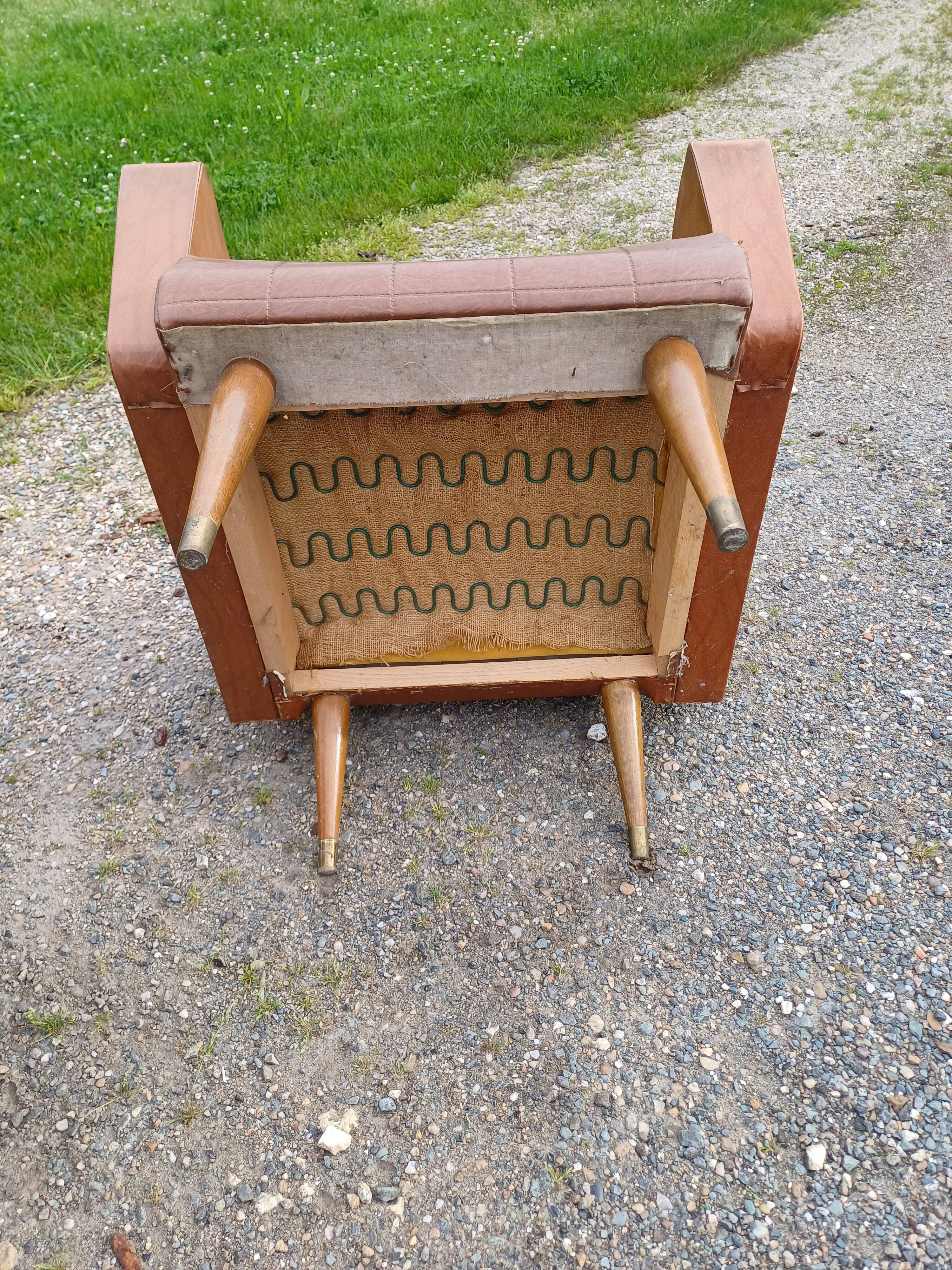 Paire de fauteuils vintage en skaï marron