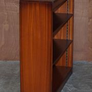 Pair of open dwarf bookshelves in mahogany by Shaws of London.