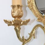 Pair of Louis XV style beveled mirror sconces in bronze by Lucien Gau