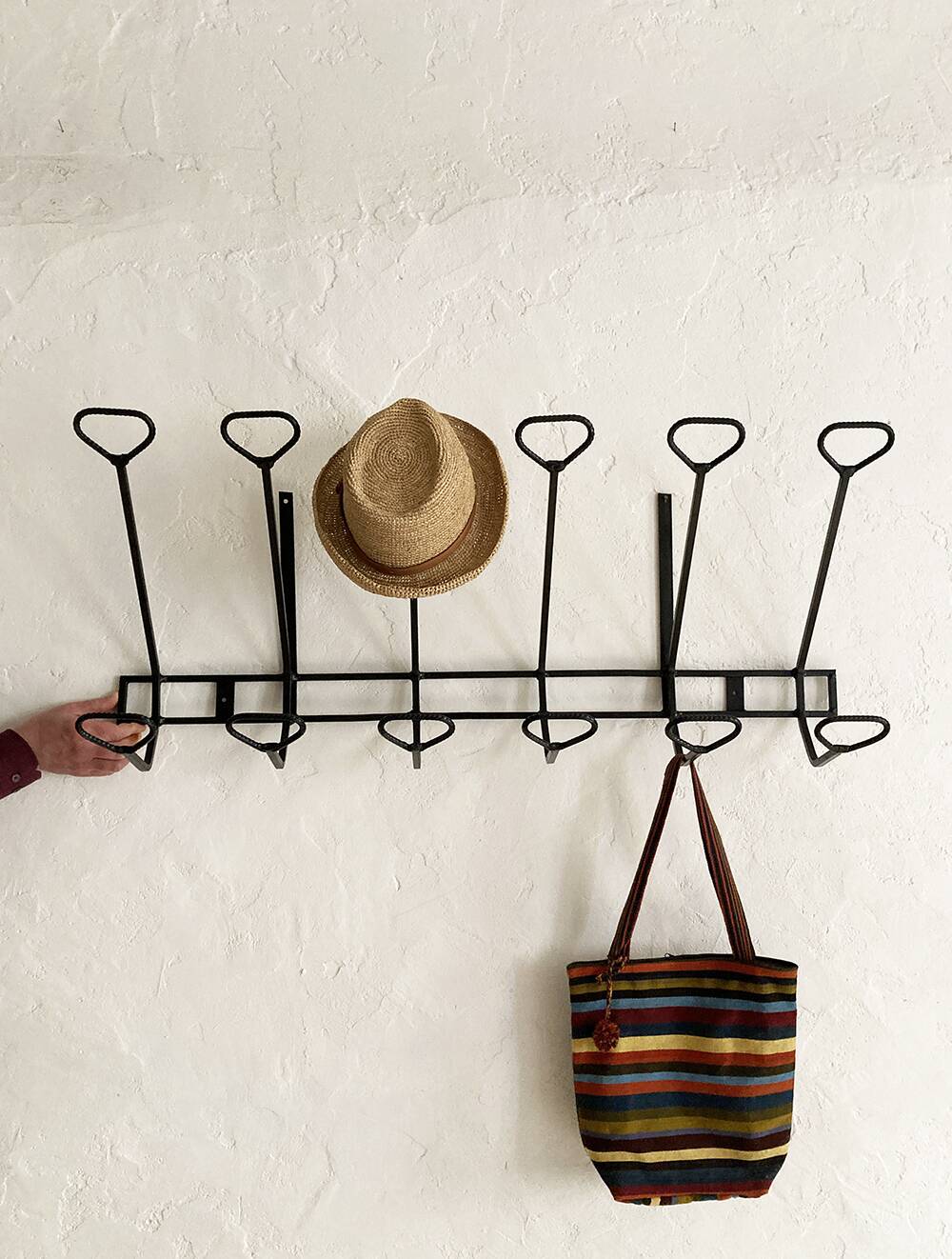 Wall-mounted coat rack with 12 hooks in handcrafted wrought iron