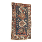 Antique kazak rug blue ground