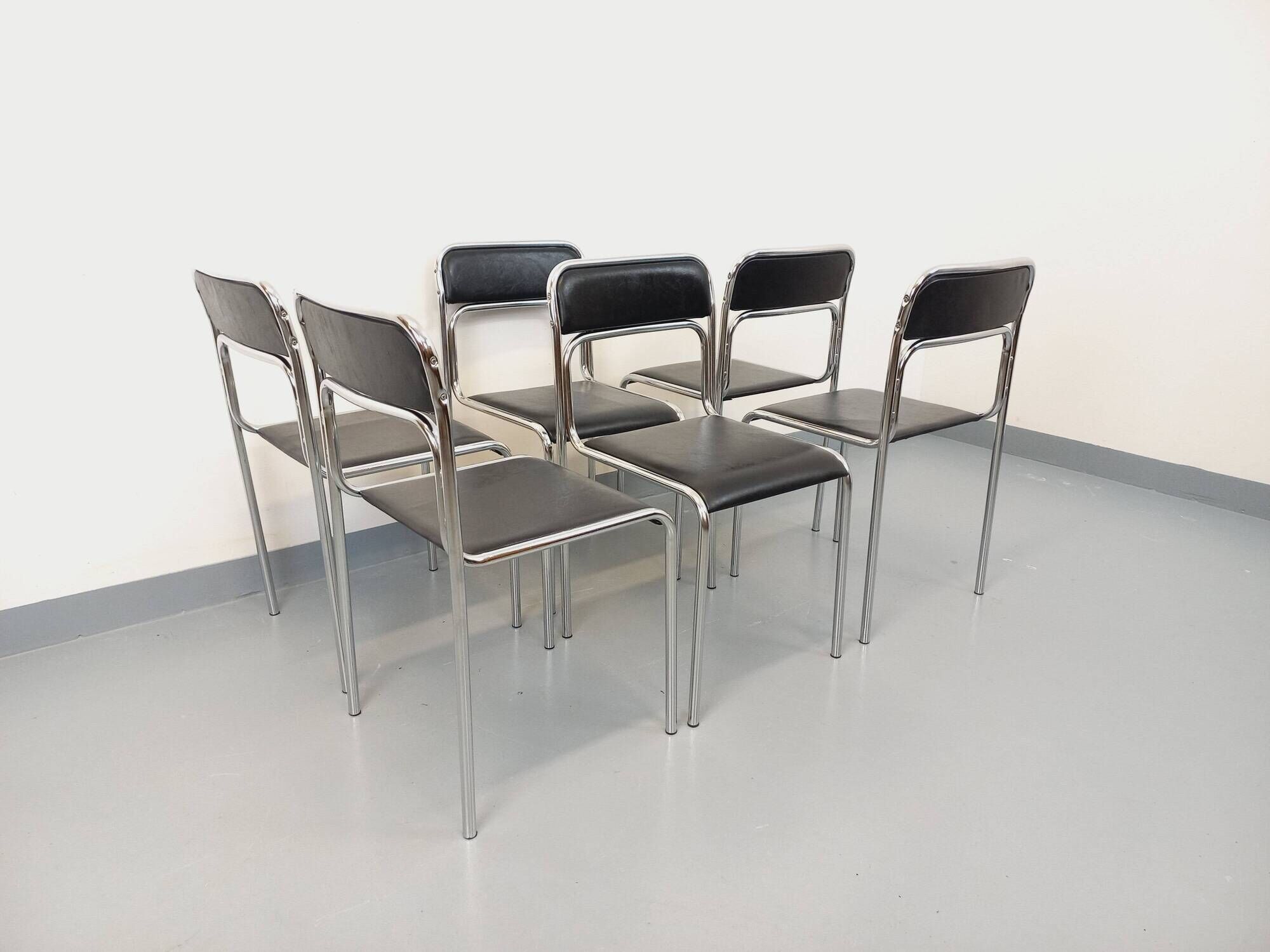 Set of 6 vintage Italian stackable chairs in chrome metal and faux leather.