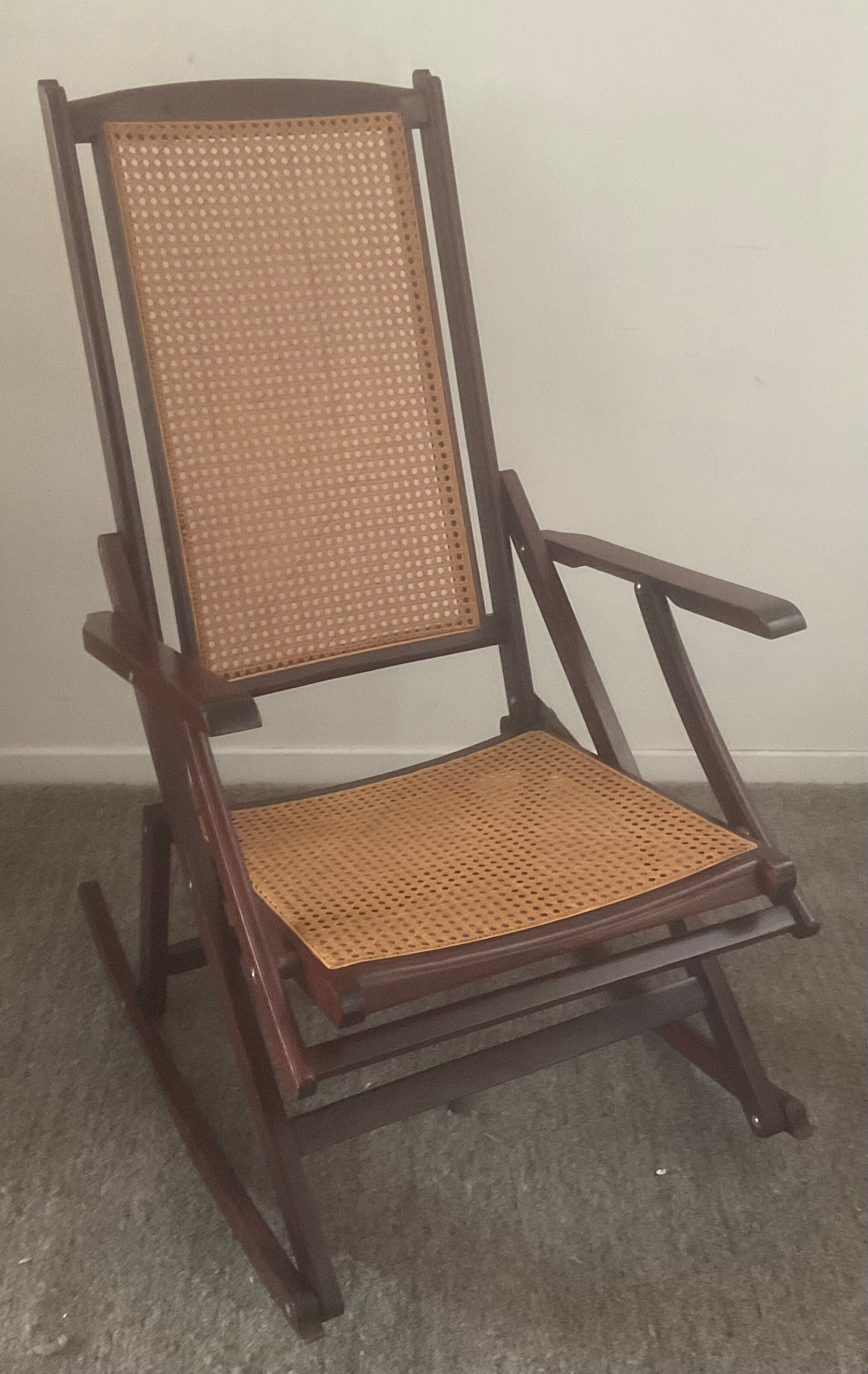 Folding wooden rocking chair and cannage from the 70s