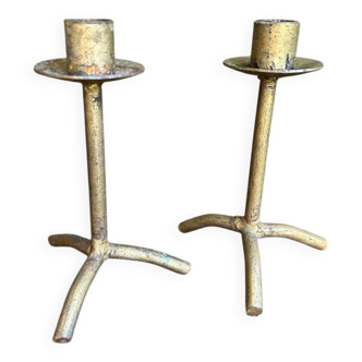 Lot de deux bougeoirs en fer forgé