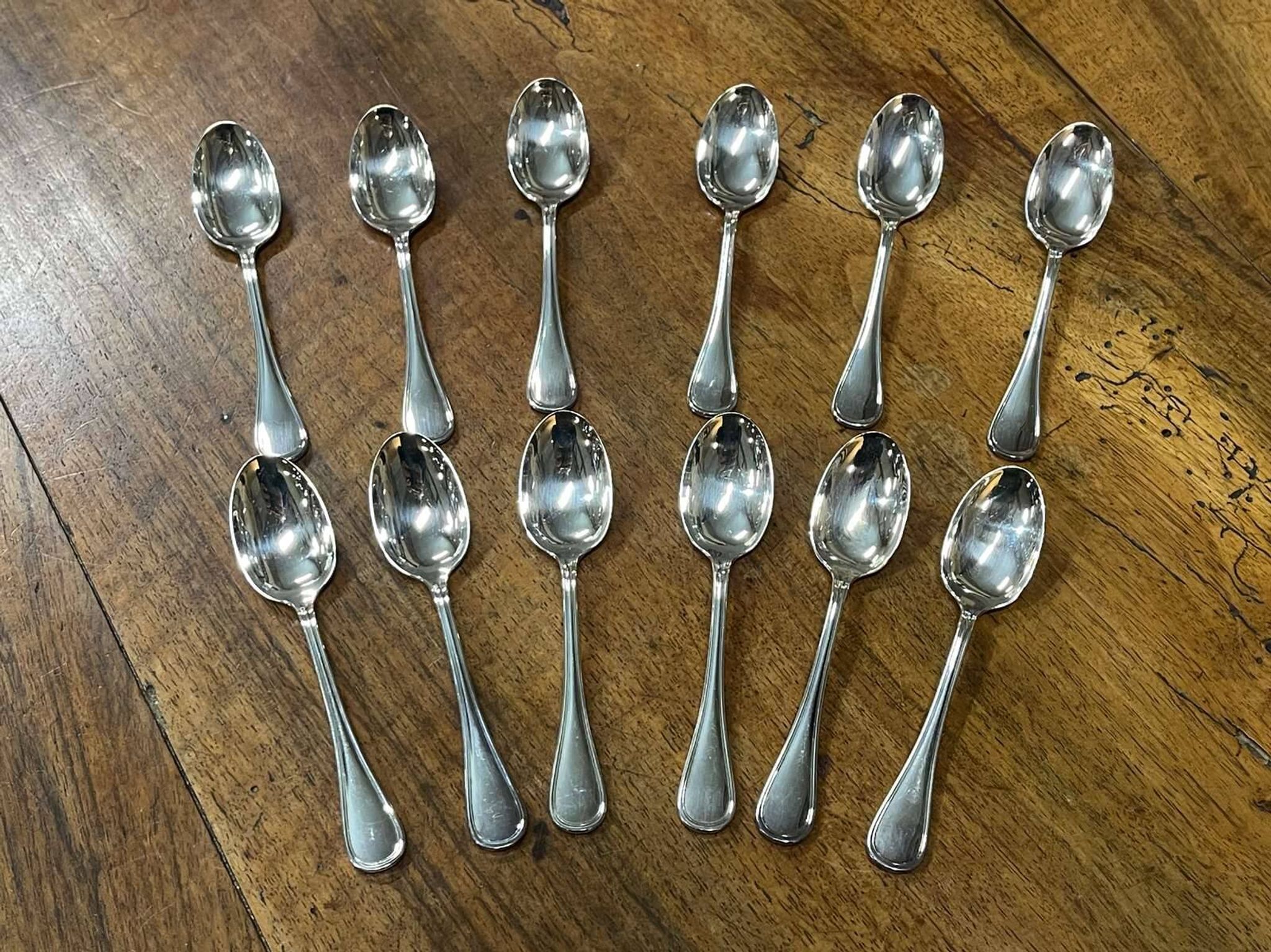 Series of 12 teaspoons in silver metal with their box