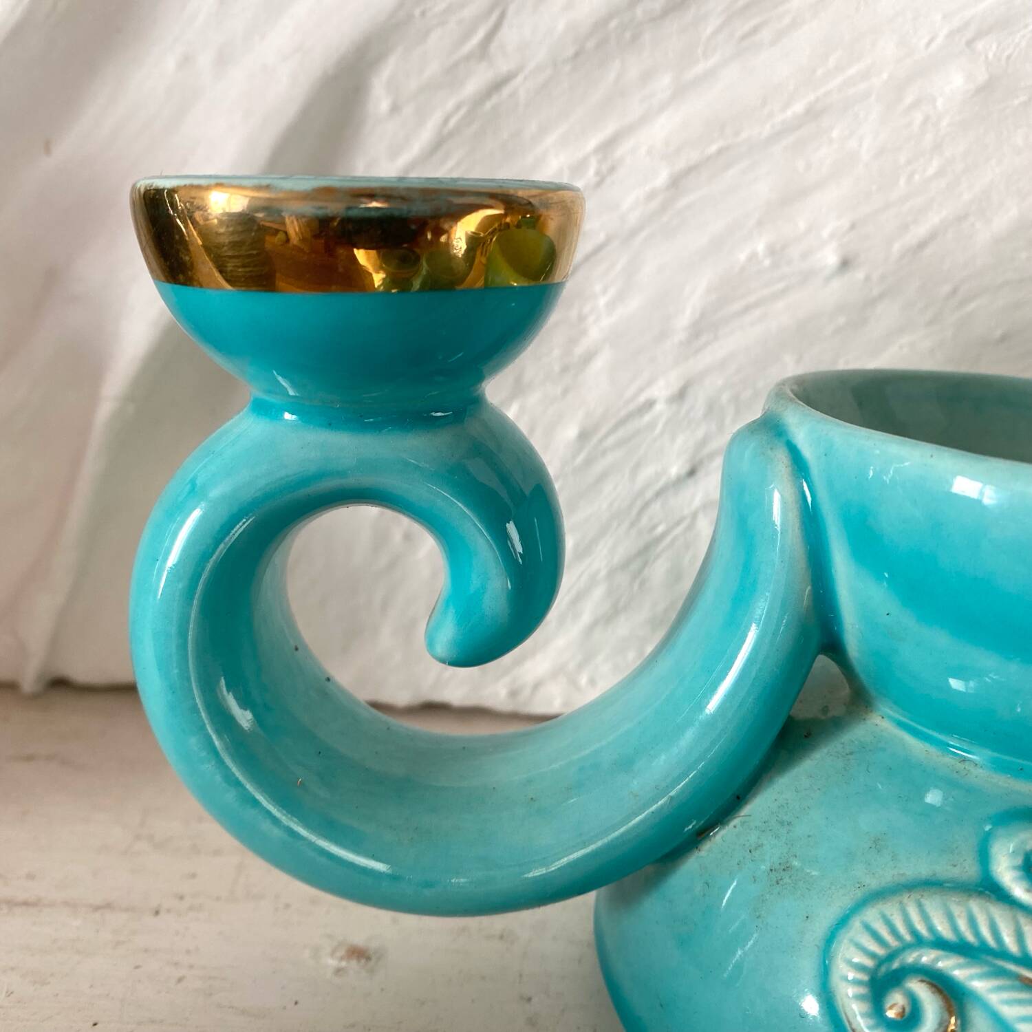 Pair of turquoise and gold double candlesticks