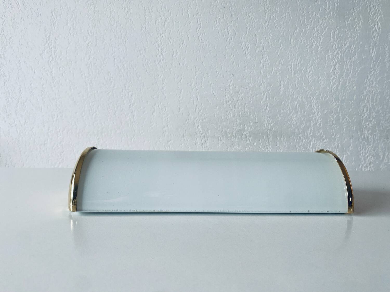 Brass and glass wall light