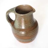 Signed stoneware pitcher