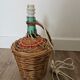 Pied de lampe dame-jeanne dans son panier
