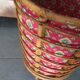 Rattan-work basket with vintage fabric