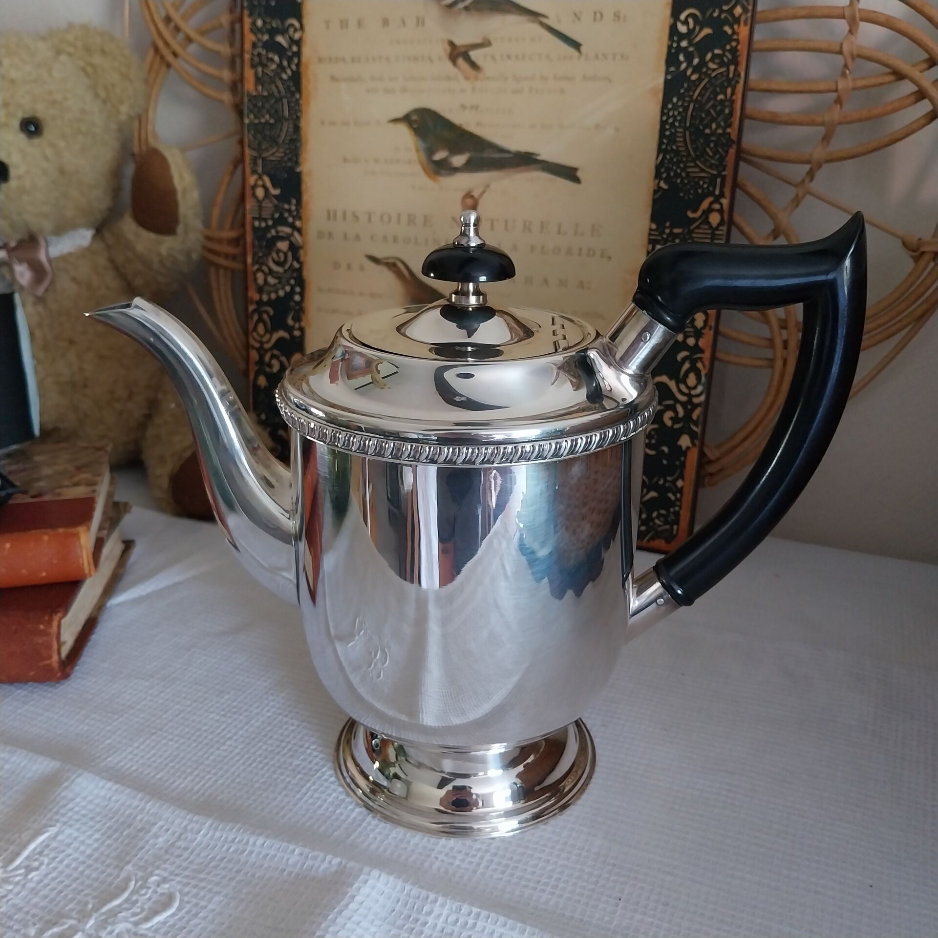 Old English coffee pot in silver-plated metal and Bakelite.