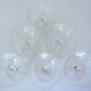 Suite of six champagne glasses on foot in engraved colorless crystal