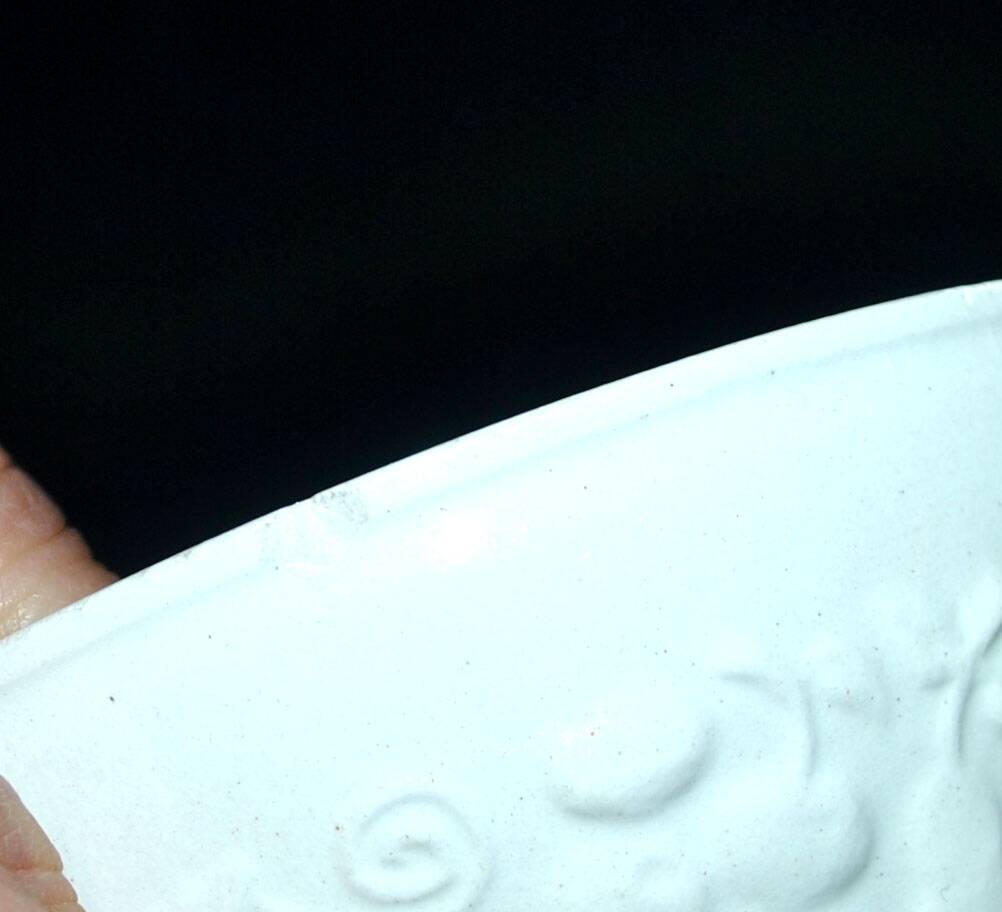 Set of 2 cups molded in opaque Sarreguemines earthenware