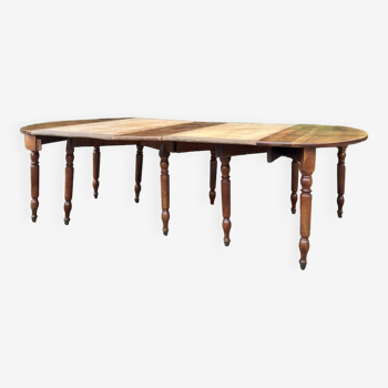 Half moon table forming walnut dining room table with 19th century period system