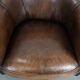 Set of two sheepskin club armchairs with fixed seat cushions