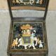 Pair of military folding chairs with Indian decoration.