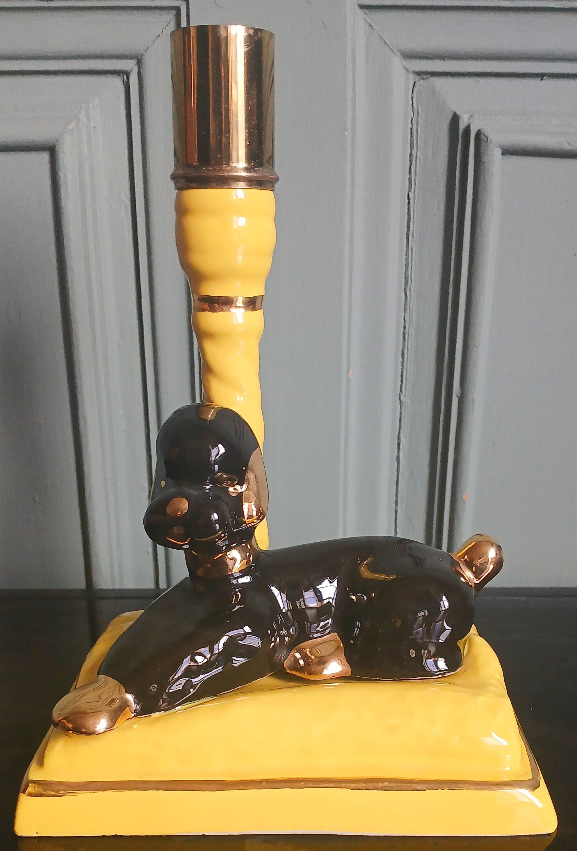 Zoomorphic lamp "poodle" in black, yellow, and gold glazed ceramic.