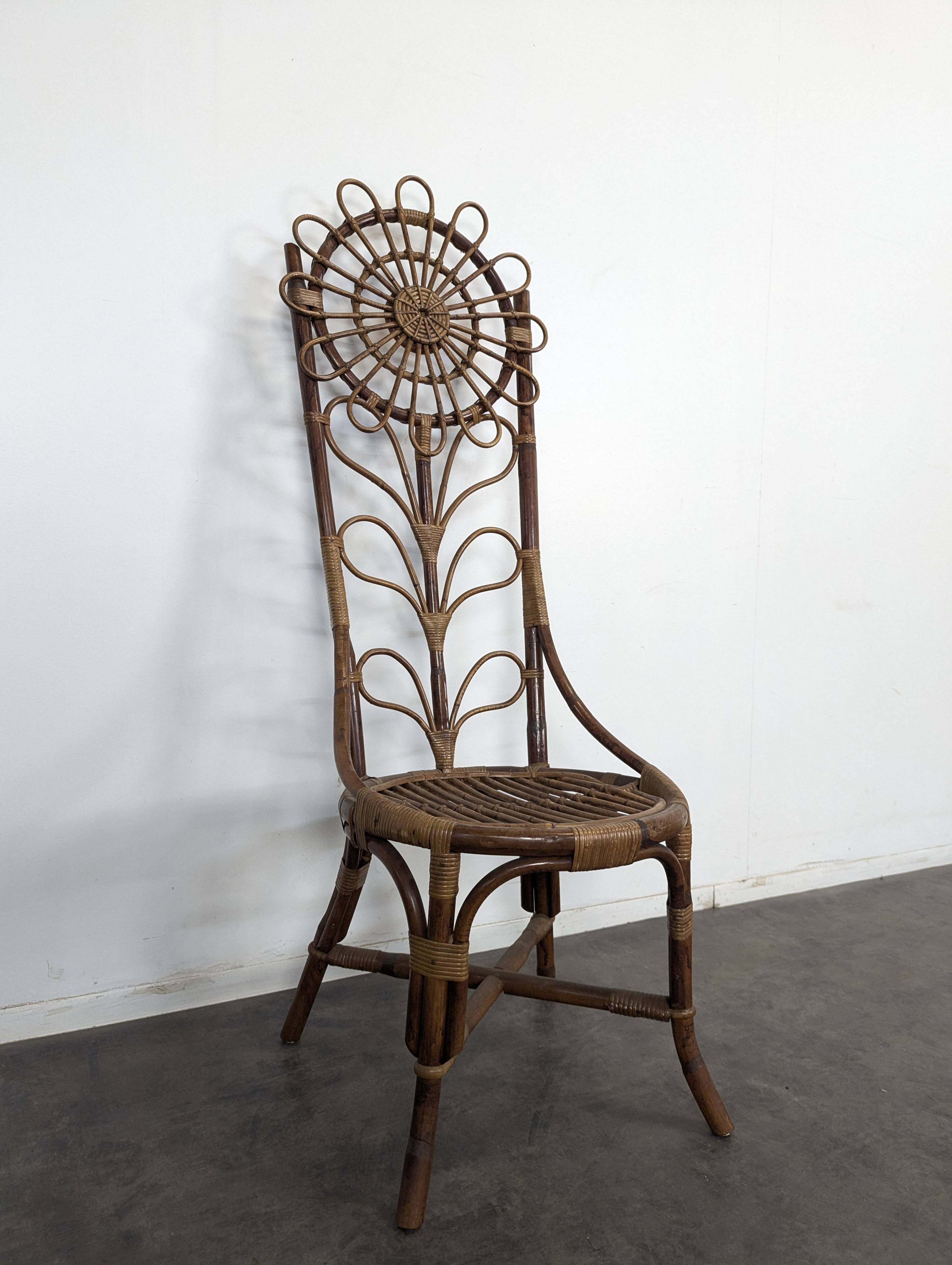 Set of 4 bamboo and rattan chairs with sunflower decoration.
