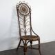 Set of 4 bamboo and rattan chairs with sunflower decoration.