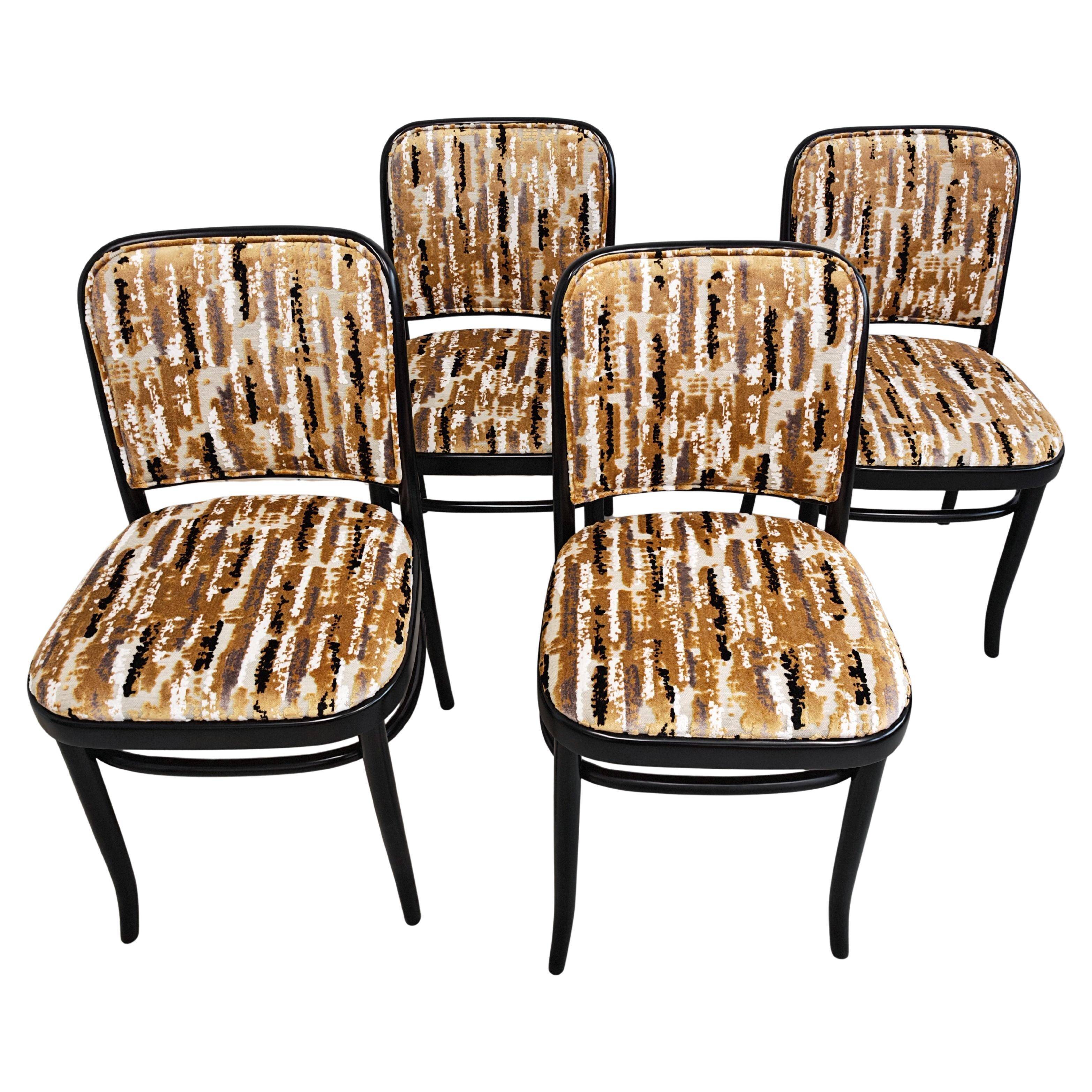 Set of 4 curved wood dining chairs by Josef Hoffmann for Mundus.