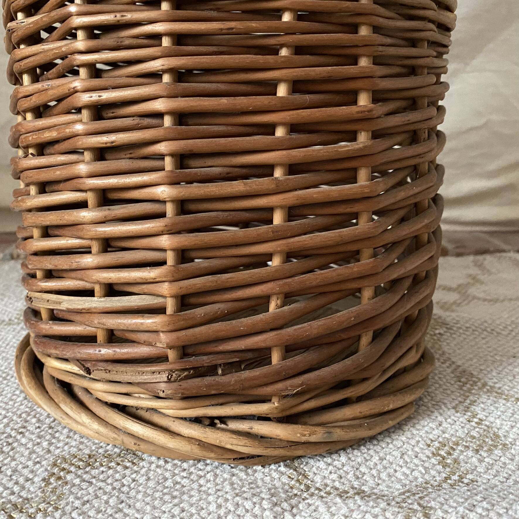 Woven wicker basket, vintage rod holder