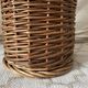 Woven wicker basket, vintage rod holder