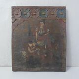 Painting on carved wood panel