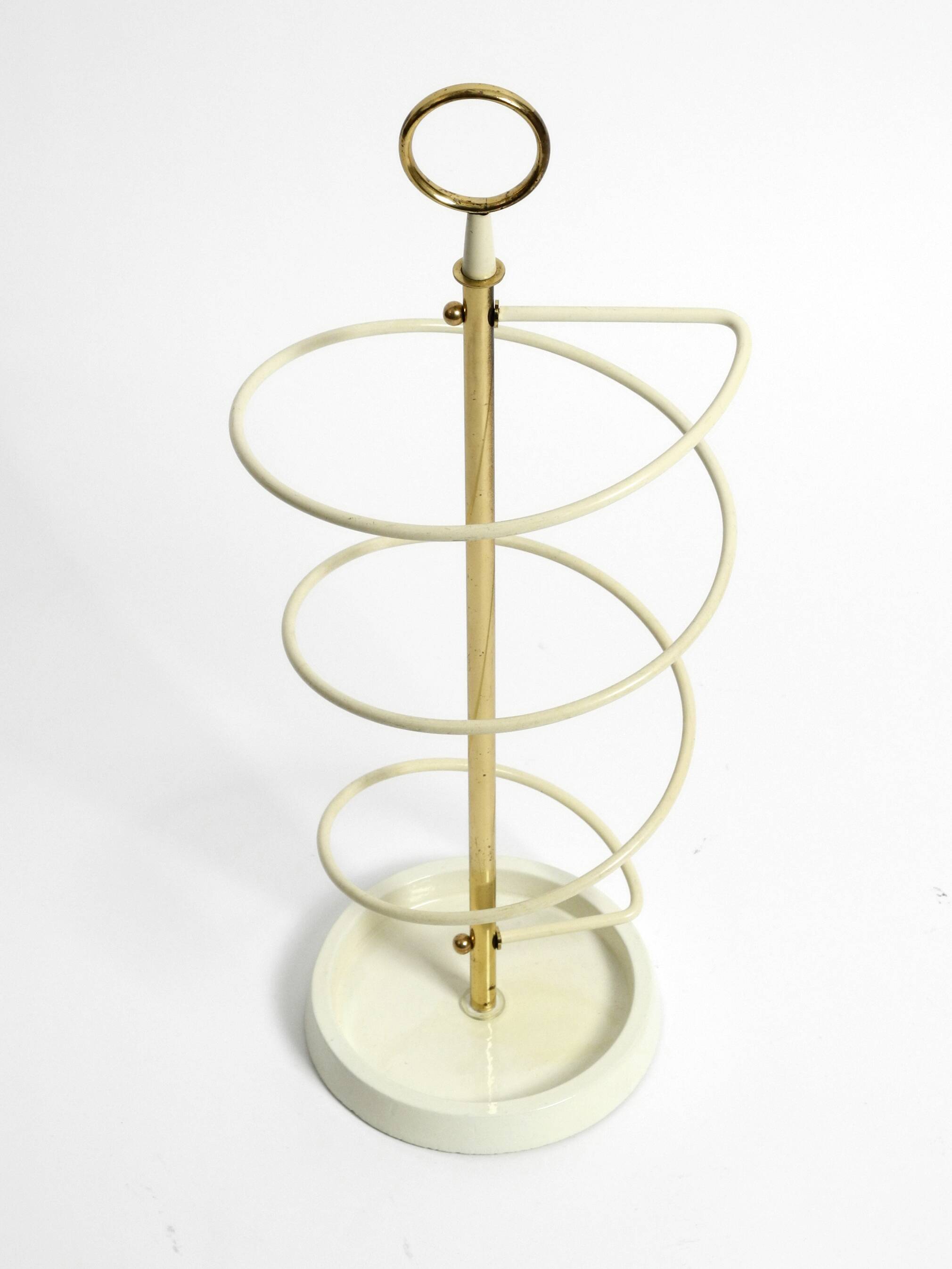 Extraordinary rare Mid Century Modern umbrella stand in string helix design
