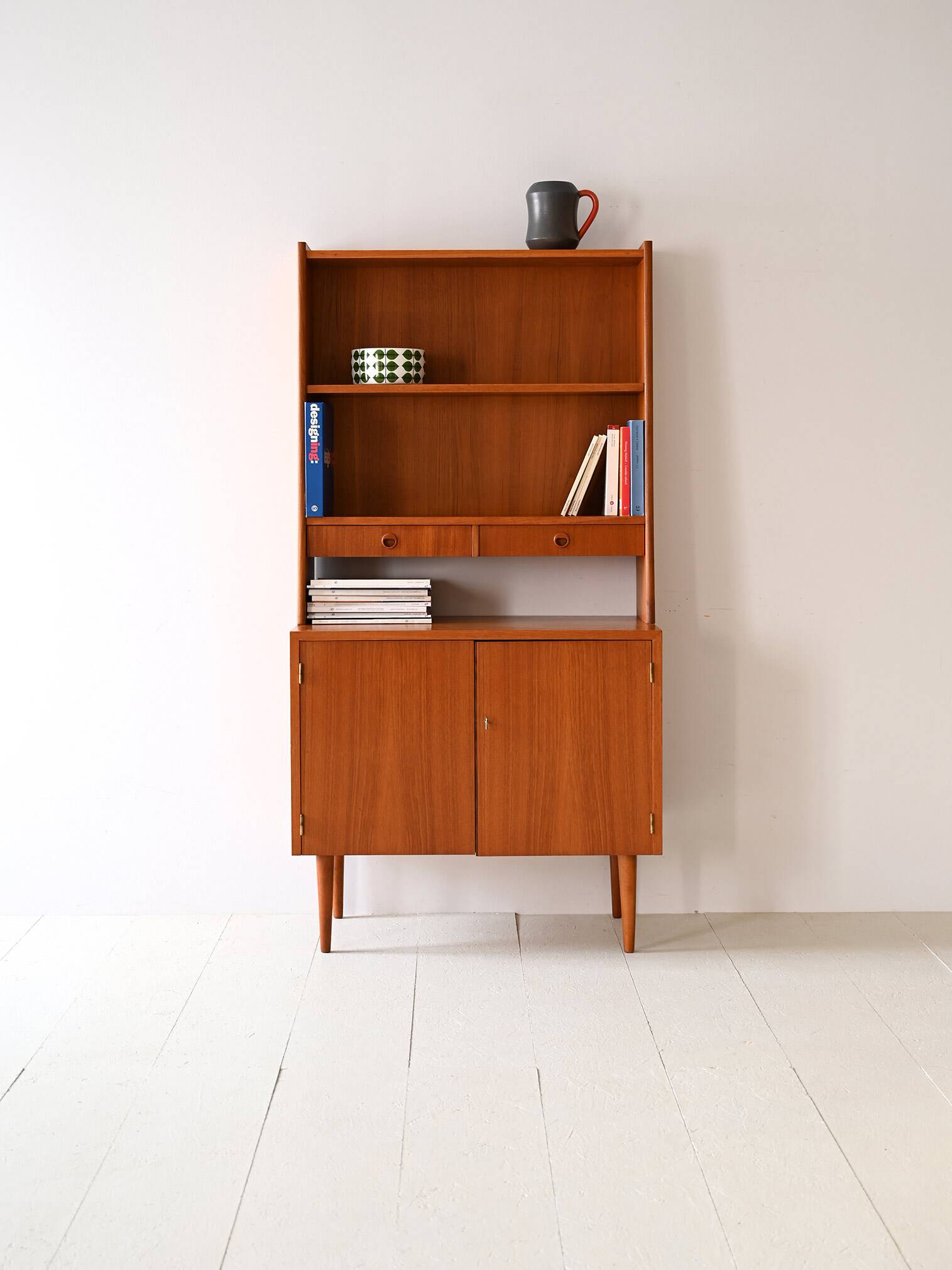 Bookcase with drawers and storage compartment