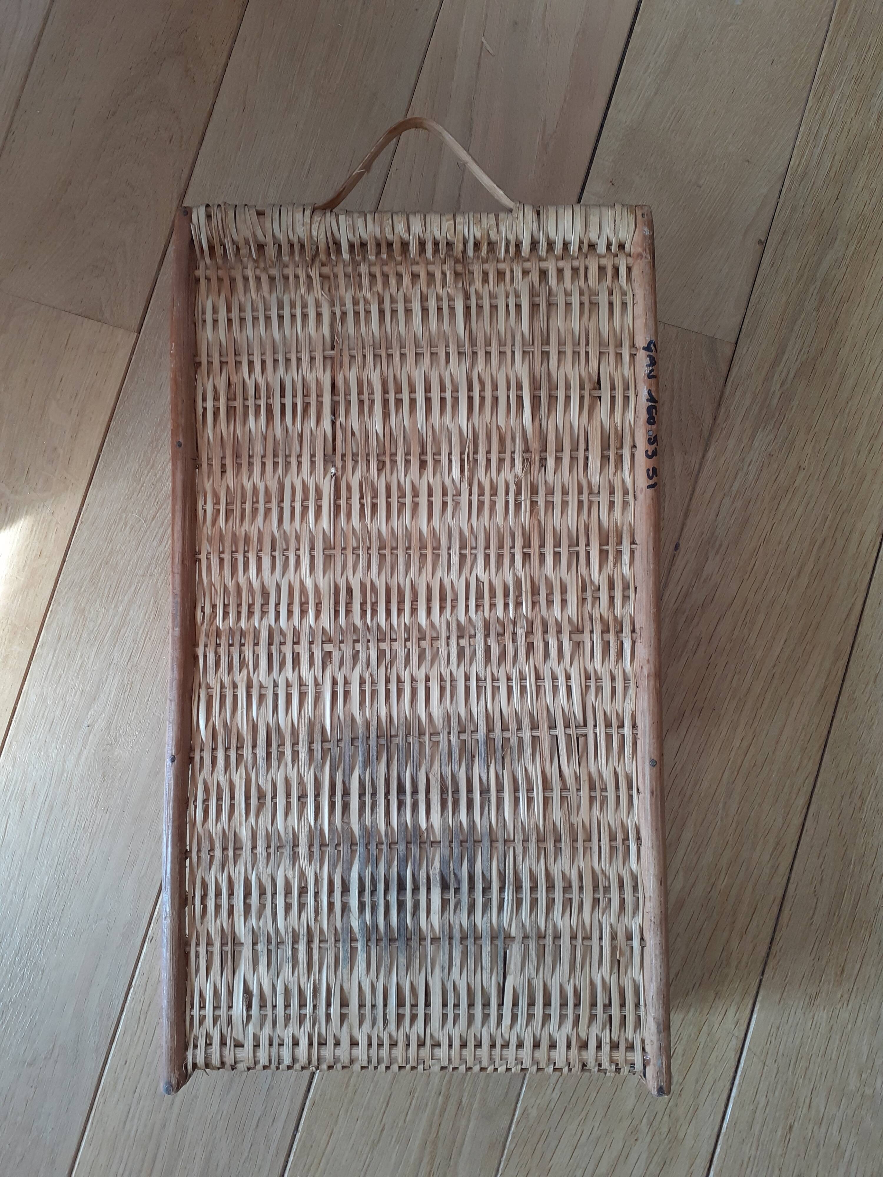 Rattan and wicker wall shelf