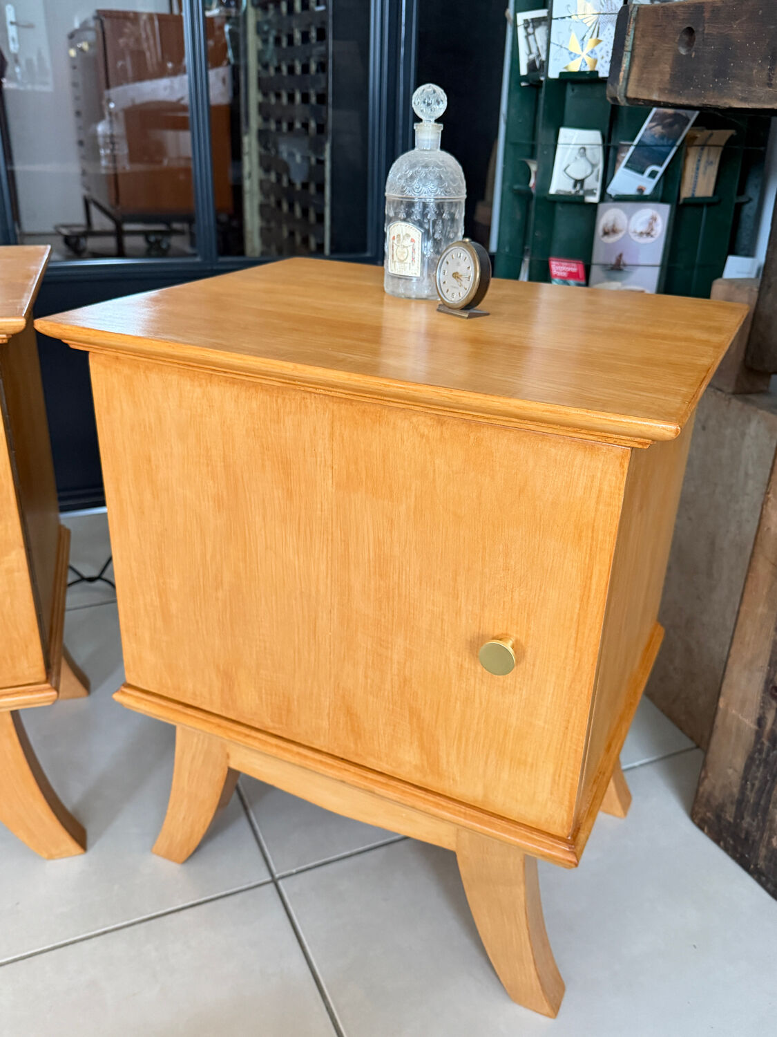 Vintage bedside table with tapered legs