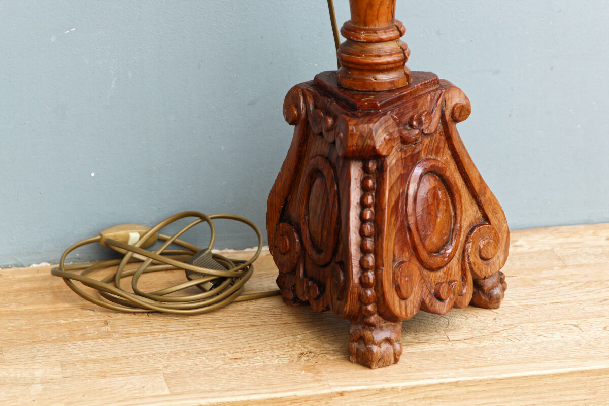 Carved wooden lamp, fiber shade