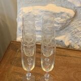 6 chiseled champagne flutes on vintage floral frieze pattern