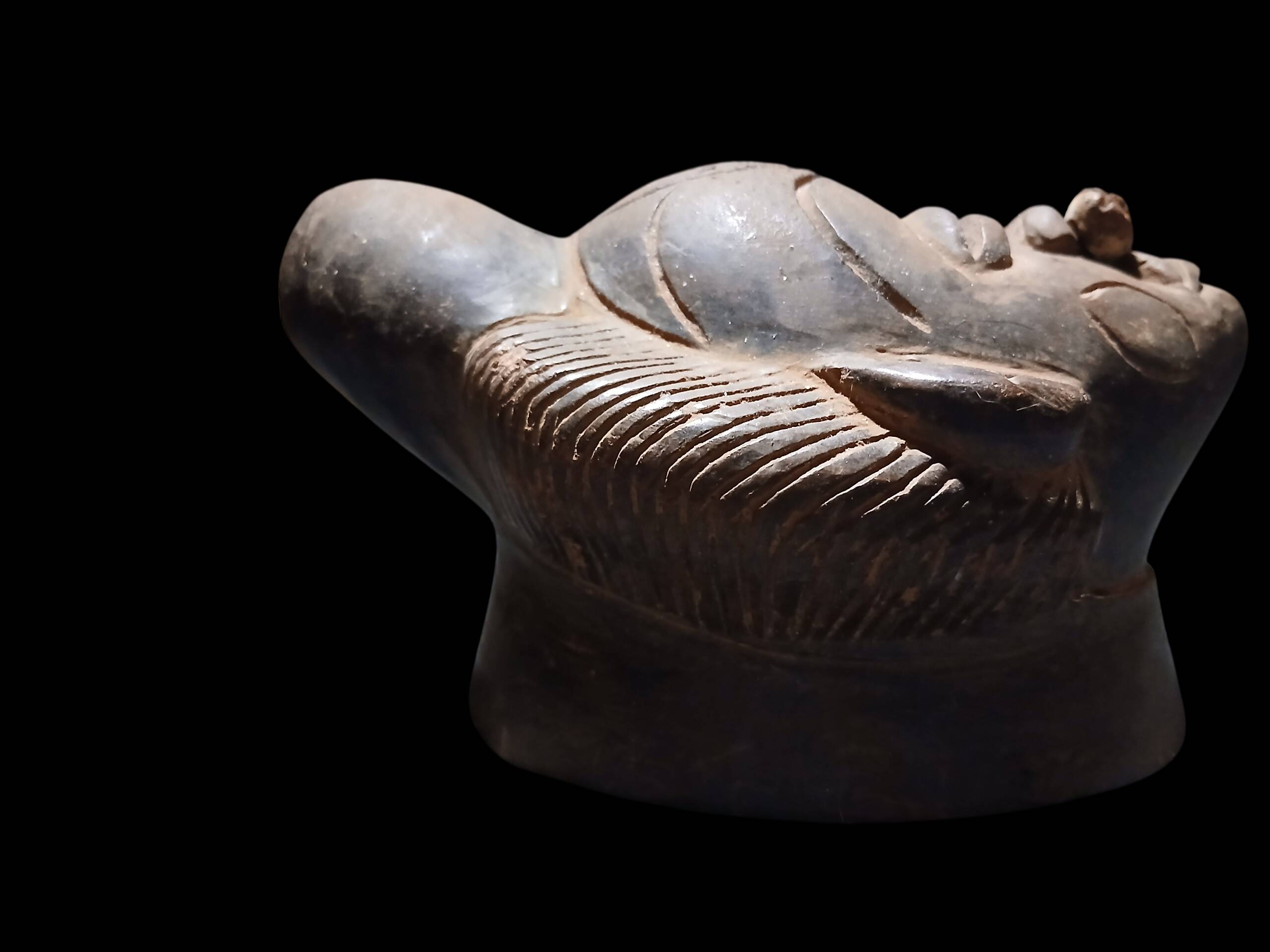 Terracotta mask from the Punu people of Gabon.