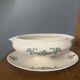 Antique sauce boat in Longchamp faience with its underplate – glazed decoration.