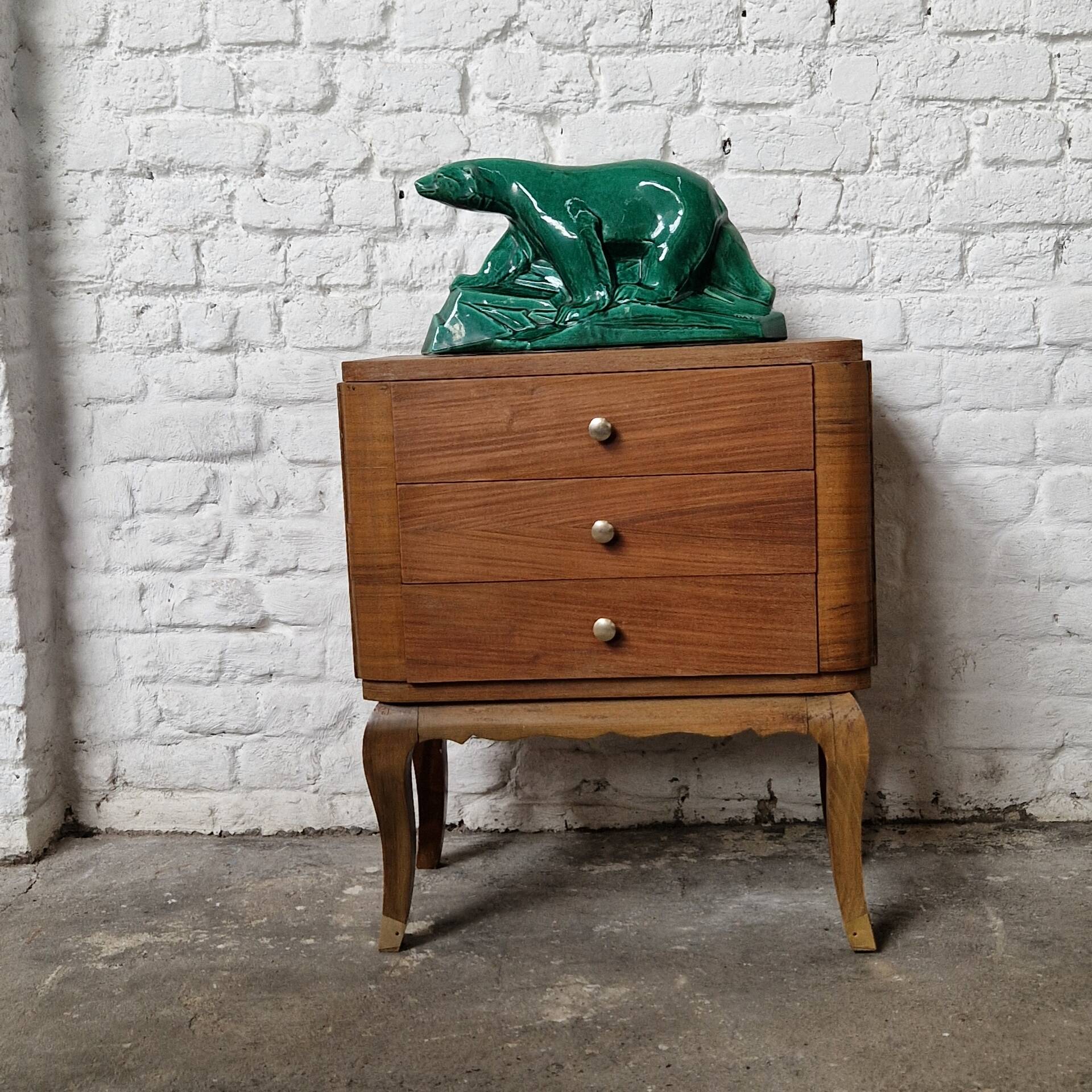 Small vintage Art Deco piece with 3 drawers, curved legs and caps.